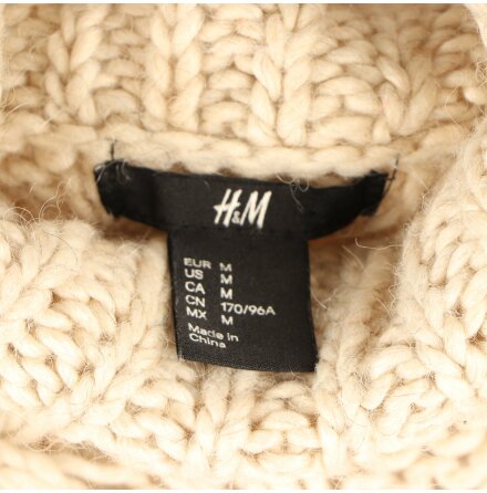 H&amp;M - Vaniljvit stickad trja - Stl. M