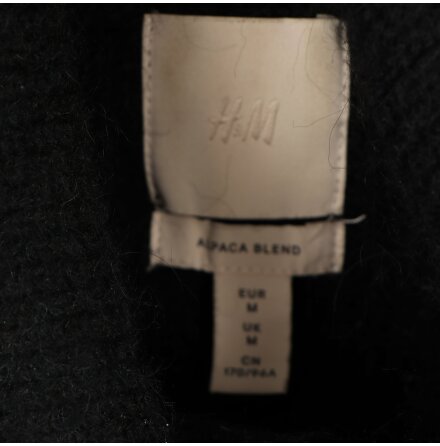 H&amp;M - Stickad trja med krage - stl. M