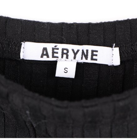 A�ryne - Svart asymetrisk kjol i figurn�ra stretchig trik� - stl. S